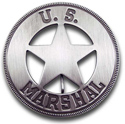 [ U.S. Marshal Badge (cut of star)]